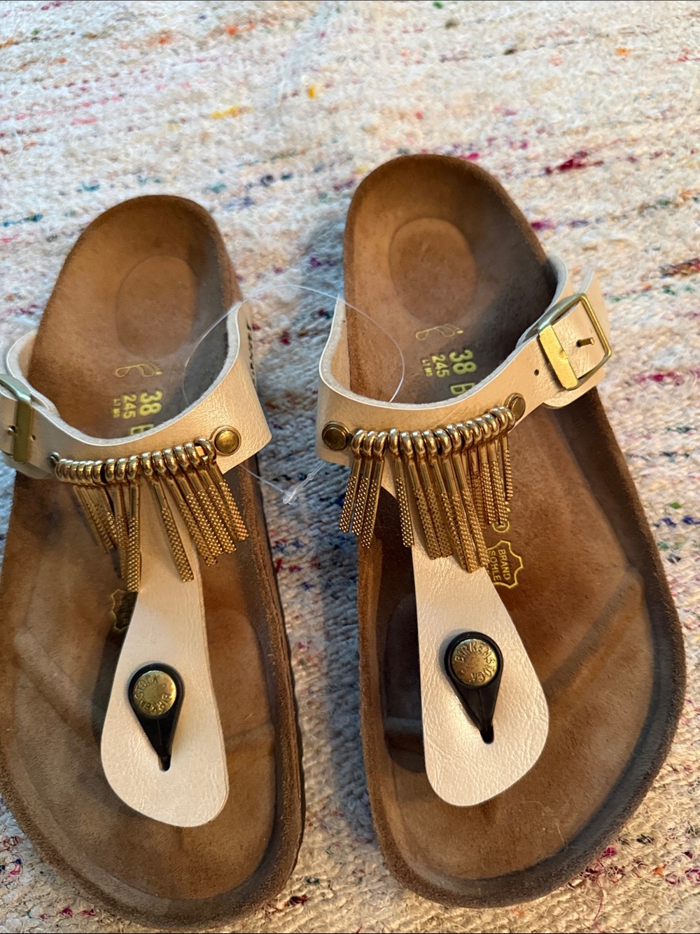 Birkenstock white/gold tassels size 8.Very Classy!